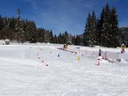 Transportband voor de eerste pogingen op de ski's