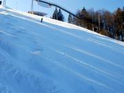 De slalomhelling heeft een hellingsgraad van 40%.