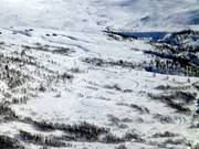 Uitzicht vanaf het skigebied op de loipes