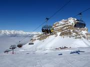 Grostè - 6-persoons hogesnelheidsstoeltjeslift (koppelbaar) met kap en stoelverwarming