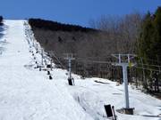 10 White Heat Quad - 4-persoons vaste stoeltjeslift