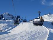 Lärchfilzen - 4-persoons hogesnelheidsstoeltjeslift (koppelbaar) met kap