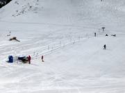 Oefenlift van de skischool bij het bergstation