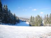 Ingang naar de onderste helling