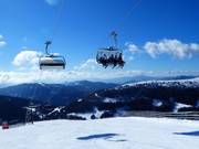 Sessellift Lachtal - 6-persoons hogesnelheidsstoeltjeslift (koppelbaar) met kap en stoelverwarming