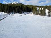 Beginnersgebied met transportbanden direct bij het dalstation