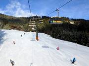 Sunshine Shuttle - 6-persoons hogesnelheidsstoeltjeslift (koppelbaar) met kap