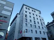 Hotel Monopol bij het dalstation van de Chantarellabahn