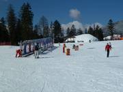Zauberteppich Wagrainis Winterwelt - Overdekt(e) transportband/Moving Carpet