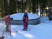 Hulp bij het instappen in de skilift