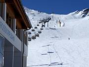 Roßkirplbahn - 4-persoons hogesnelheidsstoeltjeslift (koppelbaar) met kap