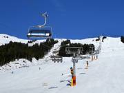 Hochalm 6er - 6-persoons hogesnelheidsstoeltjeslift (koppelbaar) met kap en stoelverwarming