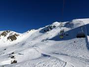 Ongesecureerde poedersneeuwhellingen bij de stoeltjeslift Sattele