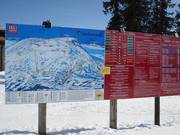 Piste-informatie bij het dalstation