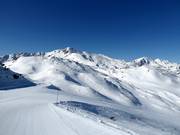 In het bovenste deel van het skigebied kun je een uitstapje maken in de diepe sneeuw.