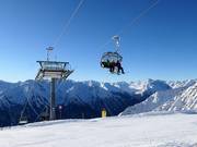 Stoeltjeslift Alblittkopfbahn met weerbeschermkappen