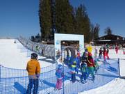 Kinderland C4 - Overdekte transportband