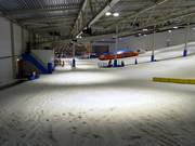 Beginnerspiste met een vlakke piste bij de sleeplift