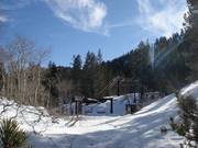 Chuter - 4-persoons vaste stoeltjeslift