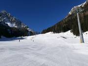 Lichte en brede piste Valbonetta in het deelgebied Ces
