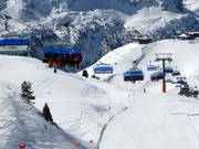 Hochalmbahn - 6-persoons hogesnelheidsstoeltjeslift (koppelbaar) met kap en stoelverwarming