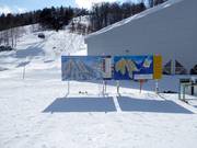 Pistekaarten bij het dalstation van Mt. Isola