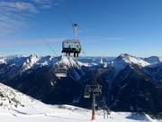 Mutegg - 4-persoons hogesnelheidsstoeltjeslift (koppelbaar) met kap