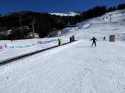 Transportband dalstation van de skischool