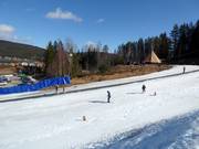 Kinderpiste met transportband