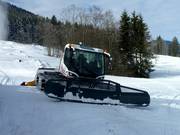 Pistenvoertuig in wachtstand