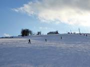 Lichte en brede piste bij de Mühlberglift