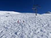 Diep sneeuw helling bij de 8-persoons stoeltjeslift Familienglück