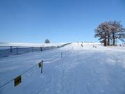 Uitzicht op lift en piste