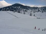 Familiepiste met transportband bij Prarion