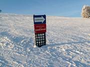 Waarschuwingsbord op de piste