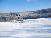 Uitzicht vanaf de diepsneeuwhelling op het liftstation