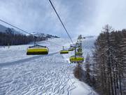 Mitterhausbahn - 8-persoons hogesnelheidsstoeltjeslift (koppelbaar) met kap en stoelverwarming