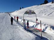 Kinderland Gerlos 2 (Arena Center) - Transportband/Moving Carpet