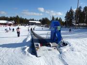 Huttumaan Taikamatto - Transportband/Moving Carpet