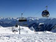 Gletscherjet 3 - Combilift met 8-persoons stoeltjes en 10-persoons gondels met stoelverwarming