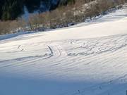 De piste bij de skilift